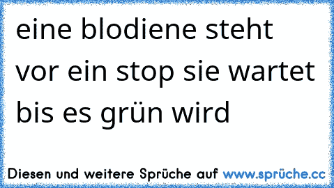 eine blodiene steht vor ein stop sie wartet bis es grün wird